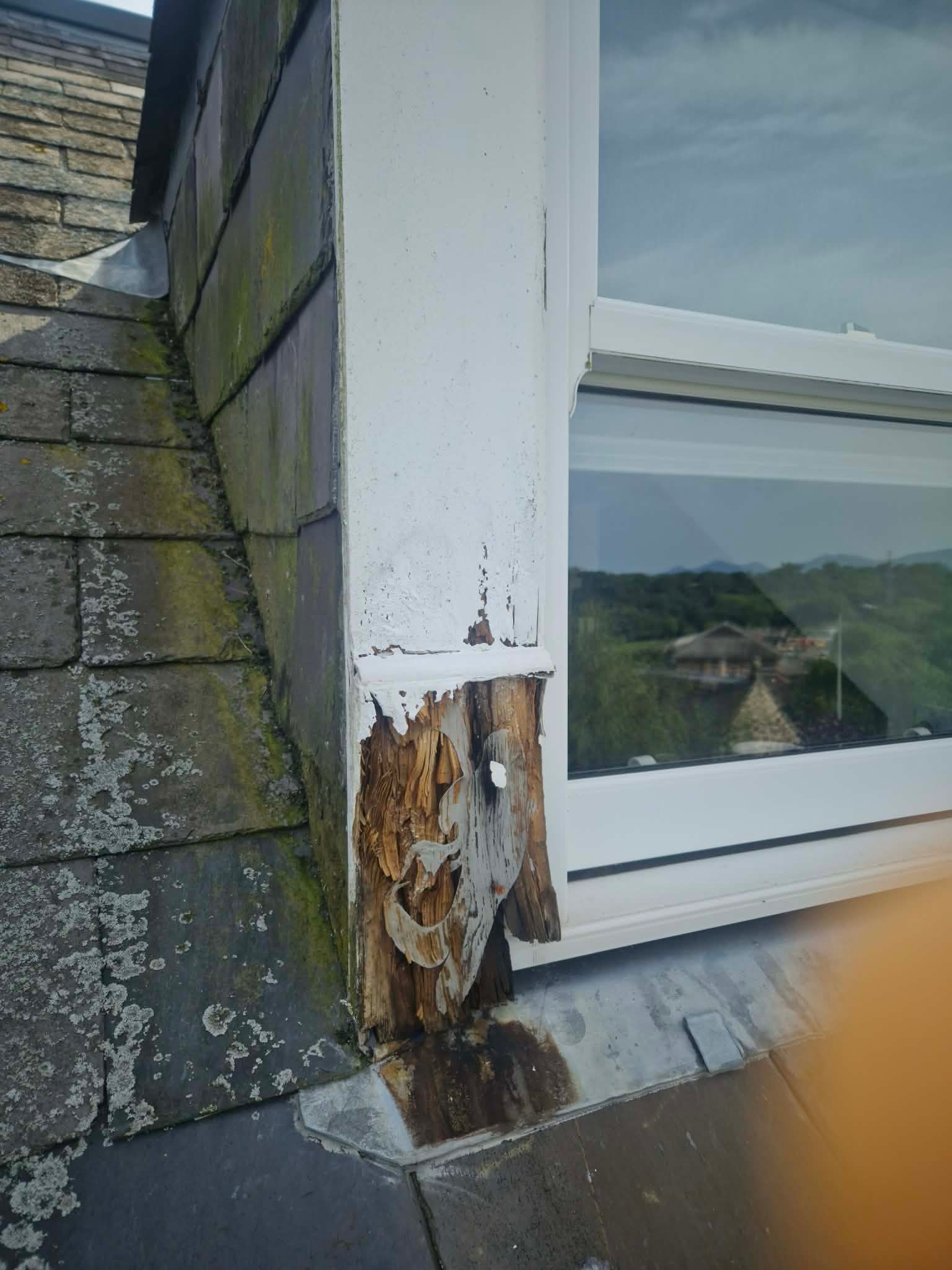 Peeling paint and weathered render — before exterior painting